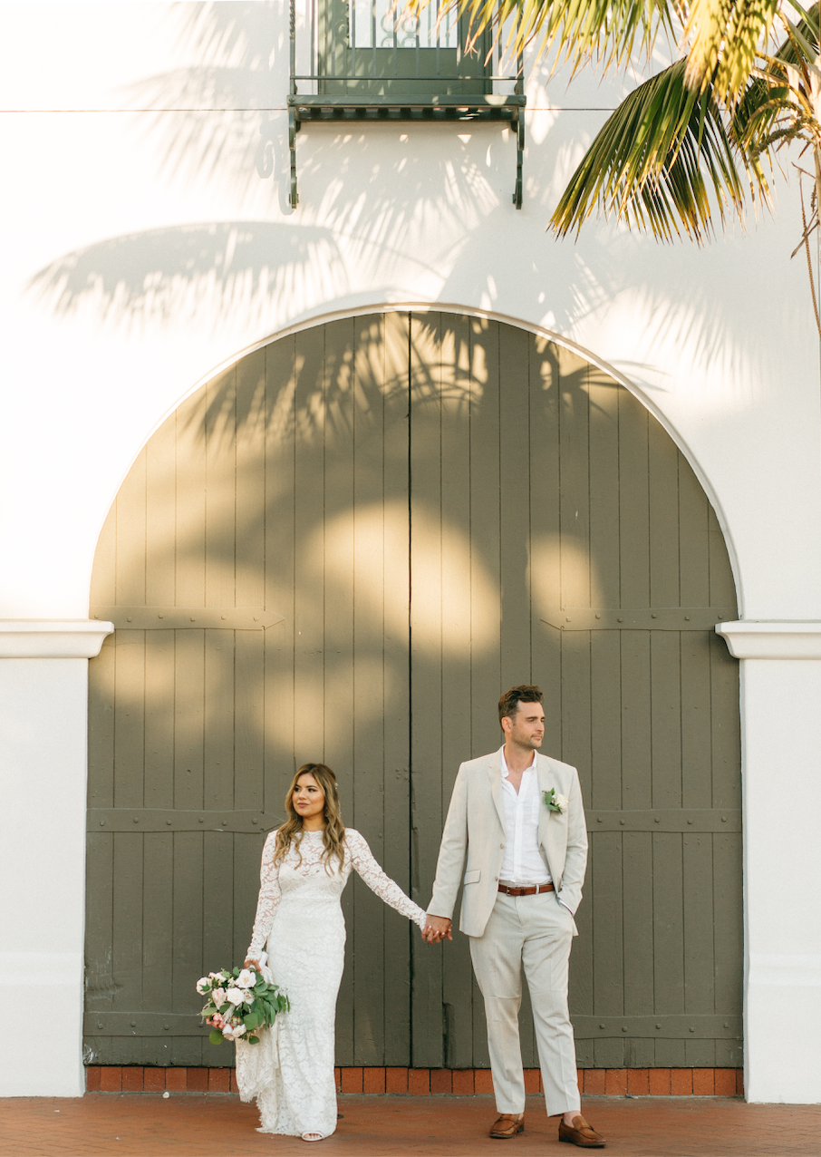 Elopement held downtown on rooftop of the Hotel Californian in Santa Barbara, Ca - views overlooking the ocean and mountians with art deco architecture.